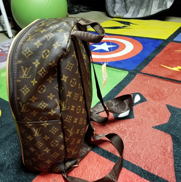 Louis Vuitton book bag - Picture 4 of 8